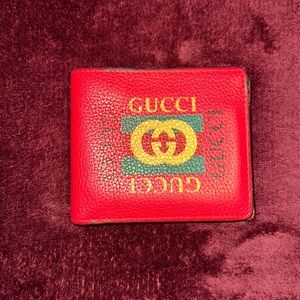 Read Gucci wallet, used still in excellent shape